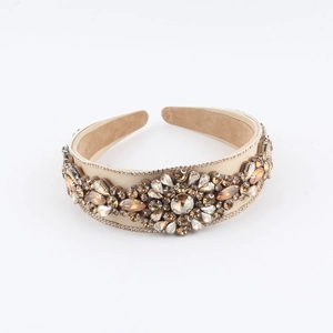 Elegant vintage padded headband with amber crystals and champagne beads for formal events