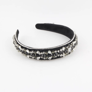 Serre-tête baroque en velours noir avec strass étincelants et motifs floraux chic