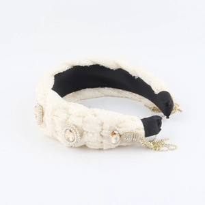 Denim knot headband with amber crystals, sequins and hanging gold tassel chains