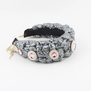 Fashionable denim knotted headband with pink gems, faux pearls and gold chain fringes