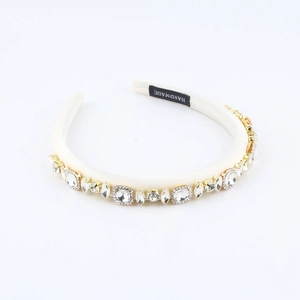 Elegant cream white baroque headband with sparkling crystals and golden claw settings