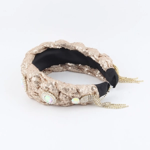 Blue denim knotted headband with champagne pearls, colorful rhinestones and crystal tassels