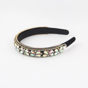Velvet headband with colorful rhinestones and floral crystal pattern on black fabric