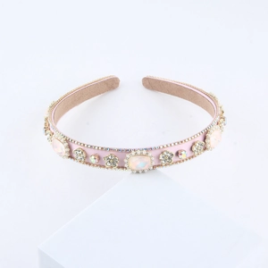 Pink satin sponge headband with luxury rhinestone embellishments and colorful crystals