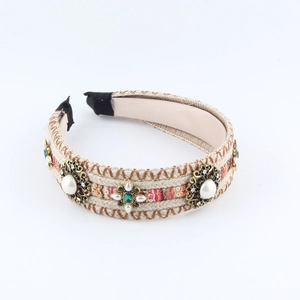 Ethnic bohemian style woven headband with colorful crystals and pearls on white base