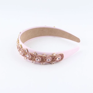 Detailed view of a pink baroque headband with rhinestones and soft anti-slip lining