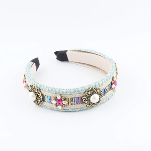 Western style mixed color woven headband with rhinestones and faux pearls on beige base