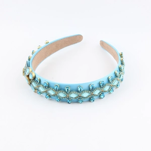 Elegant Baroque style wide headband featuring light blue gemstones and golden metal floral lace
