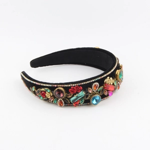 Detailed macro view of Baroque velvet headband with luxury rhinestones and rose decor