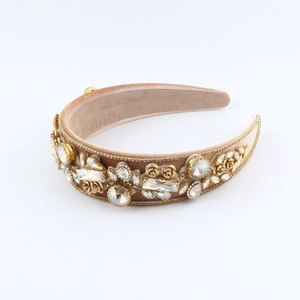 Champagne baroque padded headband featuring crystal rhinestones and metal flowers
