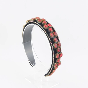Baroque padded headband with red square crystals and gold settings on black velvet