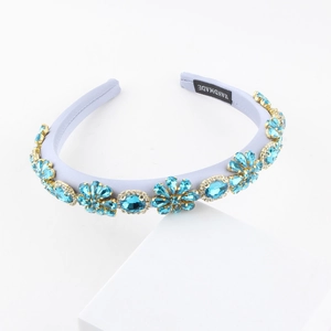 Detail of light blue baroque headband featuring handmade floral rhinestones and crystals