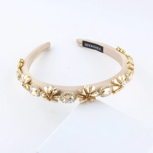Champagne satin headband with luxury floral crystal embellishments and gold metal settings