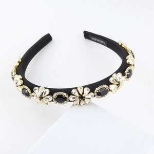 Baroque padded headband with handmade crystal flowers and rhinestones on white display