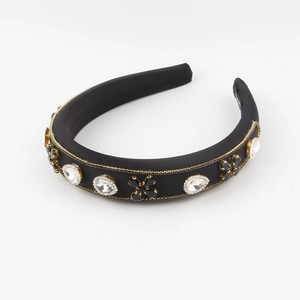 Detailed view of luxury padded headband with crystal rhinestones and beaded fringe