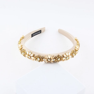 Baroque champagne fabric headband featuring sparkling rhinestone flower and pearl details