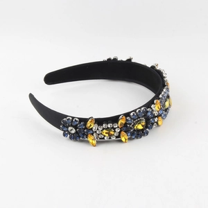 Detailed close-up of Baroque black satin headband featuring colorful rhinestone floral patterns