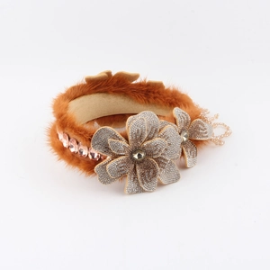 Brown mink fur headband featuring luxury rhinestone flowers and tassel bead detailing