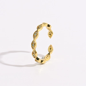 Detailed macro view of 14k gold plated evil eye ring with blue enamel and zircon inlay