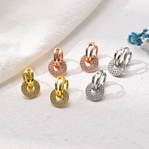 Boucles d'oreilles créoles à 4 griffes en or, or rose et argent avec pavé de zircons