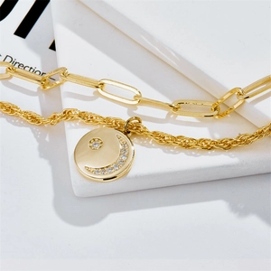 Golden layered paperclip chain necklace with moon and star zircon disc pendant