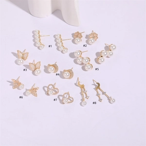 Detailed catalog of eight assorted zircon pearl earrings in 14K gold butterfly heart styles