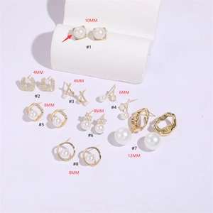 Collection of geometric gold pearl earrings with zircon inlay for elegant jewelry designs
