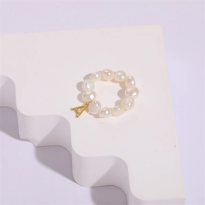 Baroque freshwater pearl beaded ring featuring a gold-plated letter A charm pendant