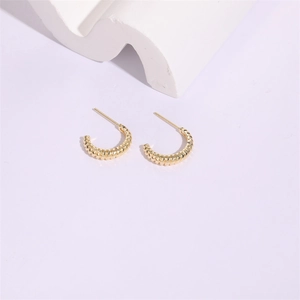 Minimalist 14K gold plated C-shape twisted hoop earrings with textured spiral design