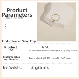 Detail of gold open ring featuring a single green AAA zircon and product specifications
