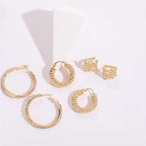 Three pairs of vintage chunky gold twisted hoop earrings with textured woven designs