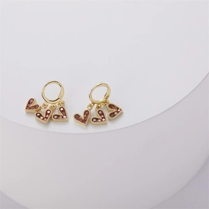 Elegant 14K gold plated hoop earrings with three red heart zircon charms for women