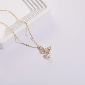 Elegant 14K gold butterfly pendant necklace with white pearl and sparkling zircon butterfly