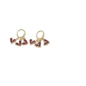 Exquisite 14K gold hoop earrings featuring three dangling pink zircon heart charms
