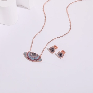 Parure de bijoux Œil de Turquie en or rose avec zircons colorés et boucles d'oreilles