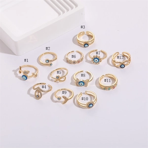 Set of 12 gold-plated evil eye rings with colorful zircon and adjustable bands