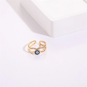 Detail of evil eye ring with blue enamel and sparkling cubic zirconia on gold band