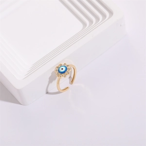 Golden adjustable sunflower ring with blue evil eye enamel and cubic zirconia stones