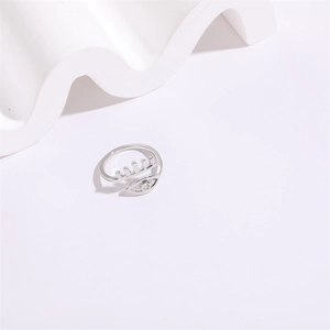 Silver evil eye open adjustable ring with cubic zirconia and eyelash design accents