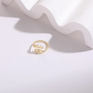 Macro detail of 14K gold-plated adjustable evil eye ring featuring a sparkling zircon stone