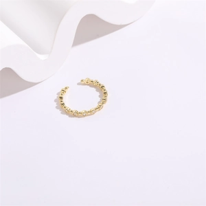Detailed macro view of 14K gold plated bubble ring with sparkling zircon stones