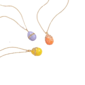 Three geometric colorful egg necklaces with 14K gold chains and enamel marble patterns