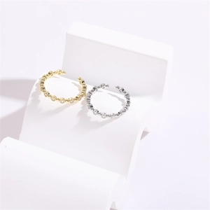 Minimalist 14K gold and silver geometric zircon rings set with bead design on white props