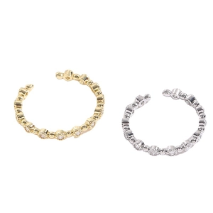 Adjustable 14K gold and silver rings set with sparkling round cubic zirconia stones