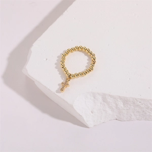 14K gold plated beaded stretch ring with a sparkling zircon cross pendant for women