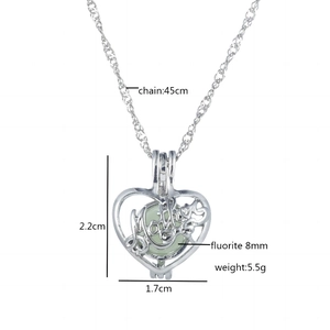 Luminous heart necklace for Mother's Day featuring a glow-in-the-dark green stone