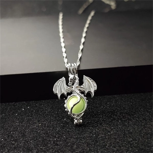 Luminous dragon pendant necklace with hollow wings and glowing bead for fantasy fans