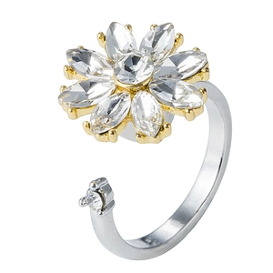 Detail of adjustable flower ring with marquise zircon petals and gold-plated setting