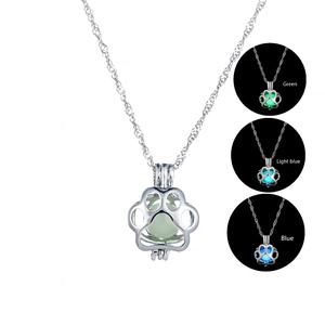 Luminous Halloween dog paw print pendant necklace with silver chain and glow-in-the-dark stone
