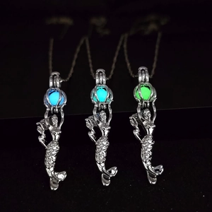 Luminous mermaid pendant necklaces in three glowing colors with silver chain